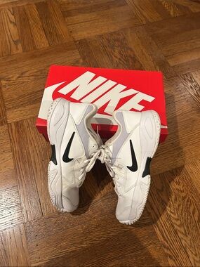Nike White Tennis Sneakers with Black Swoosh Accent